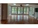 Bright sunroom with large windows offering scenic views and a tranquil atmosphere at 117 Linwood Ln, Clayton, NC 27527