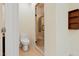 Modern bathroom features a frameless glass shower and low-flow toilet at 1217 Mauldin Rd, Wake Forest, NC 27587