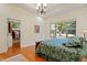 Bright bedroom with hardwood floors, walk-in closet, and scenic views at 1217 Mauldin Rd, Wake Forest, NC 27587