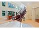 Grand foyer featuring high ceilings, staircase, and open view to the living room at 1217 Mauldin Rd, Wake Forest, NC 27587