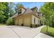 Spacious three-car garage with ample parking space and well-maintained landscaping at 1217 Mauldin Rd, Wake Forest, NC 27587