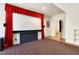 Entertainment area with a large screen and cozy seating for movie enjoyment at 1217 Mauldin Rd, Wake Forest, NC 27587