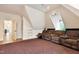 Spacious home theater with plush seating and a projector for movie nights at 1217 Mauldin Rd, Wake Forest, NC 27587