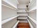 Organized pantry with shelving providing plenty of storage space for food and supplies at 1217 Mauldin Rd, Wake Forest, NC 27587