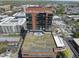 View of the luxury high-rise featuring balconies, rooftop garden, and city views at 122 N Harrington St # 775, Raleigh, NC 27603