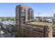 Modern brick high-rise featuring balconies, and rooftop garden at 122 N Harrington St # 775, Raleigh, NC 27603
