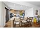 Gourmet kitchen with a large island, modern appliances, and stylish bar stools for casual dining at 122 N Harrington St # 775, Raleigh, NC 27603