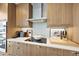 Modern kitchen featuring sleek cabinetry, stainless steel appliances, and ample counter space at 122 N Harrington St # 775, Raleigh, NC 27603