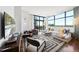 Bright living room with floor to ceiling windows and elegant furniture at 122 N Harrington St # 775, Raleigh, NC 27603