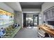 Office space with desk, Peloton, and walkout patio at 122 N Harrington St # 775, Raleigh, NC 27603