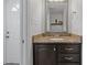 Convenient bathroom with vanity sink, granite countertop and elegant mirror at 1220 Manassas Ct Ct # E, Raleigh, NC 27609