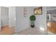 Bright dining nook featuring neutral decor and tiled floors at 1220 Manassas Ct Ct # E, Raleigh, NC 27609