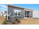 Backyard features include an AC unit, screened porch, and grey siding at 1243 White Flint Cir, Durham, NC 27703