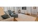Bright living room with hardwood floors, neutral decor, with seamless flow to the outdoors at 1243 White Flint Cir, Durham, NC 27703