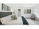 Comfortable bedroom with large window and a closet for storage at 1277 Teakwood Pl, Raleigh, NC 27606