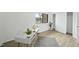Bright bedroom features a desk, sleek flooring, and a sliding door closet at 1277 Teakwood Pl, Raleigh, NC 27606