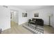 Cozy living room with zebra art, warm lighting, and modern decor offers a comfortable retreat at 1277 Teakwood Pl, Raleigh, NC 27606