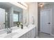 Bathroom features a double sink vanity, a bathtub and a separate shower area at 136 Ashlyn Ridge Dr, Garner, NC 27529