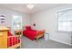 Cozy bedroom with twin beds, a window, neutral walls and carpet at 136 Ashlyn Ridge Dr, Garner, NC 27529