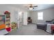 Spacious bedroom with a ceiling fan, lots of sunlight and neutral walls and carpet at 136 Ashlyn Ridge Dr, Garner, NC 27529