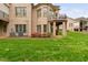 Well-manicured backyard with lush green grass and tasteful landscaping, perfect for outdoor activities at 144 Arabella Ct, Cary, NC 27518