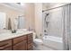Bathroom featuring a marble countertop vanity and a tub shower with mosaic style tile at 144 Arabella Ct, Cary, NC 27518