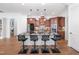 Spacious kitchen island with seating and views into other living spaces at 144 Arabella Ct, Cary, NC 27518