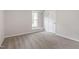 Cozy bedroom featuring neutral carpet and paint, a window seat, and a closet at 206 Woods Run, Knightdale, NC 27545