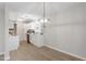 Bright and airy kitchen featuring stainless steel appliances, white cabinets, and plenty of counter space at 206 Woods Run, Knightdale, NC 27545
