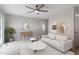 Comfortable living room with hardwood floors, a decorative front door, and neutral-colored furniture at 206 Woods Run, Knightdale, NC 27545