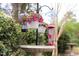 Flower baskets with decorative accents at 2061 Carriage Way, Chapel Hill, NC 27517
