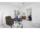Spacious living room features cozy seating, and a ceiling fan at 2061 Carriage Way, Chapel Hill, NC 27517
