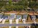Aerial view of a home with well-manicured lawns and landscaping at 2075 Toad Hollow Trl, Apex, NC 27502