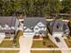 Charming home with a well-maintained lawn, two-car garage, and inviting curb appeal at 2075 Toad Hollow Trl, Apex, NC 27502