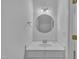 Powder room with a single sink and decorative lighting at 208 Chandler Chase Ct, Morrisville, NC 27560