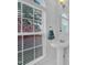 Bright bathroom showcasing a pedestal sink, arched window, and natural light at 208 Chandler Chase Ct, Morrisville, NC 27560