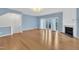 Inviting living room with a fireplace and natural light flowing through sliding glass doors at 208 Chandler Chase Ct, Morrisville, NC 27560