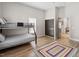 Shared bedroom features a bunk bed, closet with sliding doors, and wooden floors at 208 S Guthrie Ave, Durham, NC 27703