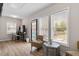 Bonus room has multiple windows providing lots of natural light and access to rear deck at 208 S Guthrie Ave, Durham, NC 27703