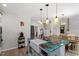 Spacious kitchen featuring a unique island design, modern lighting, and open layout at 208 S Guthrie Ave, Durham, NC 27703
