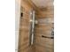 Stylish shower with tiled walls, a sleek shower panel, and a rainfall shower head at 208 S Guthrie Ave, Durham, NC 27703