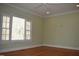 This bedroom features neutral green walls, white trim and ceiling fan at 218 Keith Hills Rd, Lillington, NC 27546