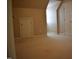 Bright bedroom with neutral walls, dormer window, carpeted floor, and features a door at 218 Keith Hills Rd, Lillington, NC 27546