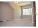 Bedroom featuring neutral walls, a bright window, ceiling fan, and carpeted floor at 218 Keith Hills Rd, Lillington, NC 27546