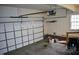 Spacious garage featuring an automatic door opener and ample room for parking and storage at 218 Keith Hills Rd, Lillington, NC 27546
