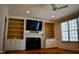 This living room offers recessed lighting, built-in shelving, fireplace and neutral paint at 218 Keith Hills Rd, Lillington, NC 27546