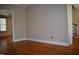 A bright living room featuring neutral paint, hardwood flooring and recessed lighting at 218 Keith Hills Rd, Lillington, NC 27546