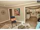 Stylish living room featuring hardwood floors and a view of the kitchen at 220 Barclay Rd, Chapel Hill, NC 27516