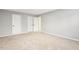 Spacious bedroom with plush neutral carpet and access to additional rooms at 2310 Nutting Ln, Apex, NC 27523