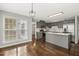 Kitchen featuring stainless appliances, gray cabinetry, and modern finishes at 2310 Nutting Ln, Apex, NC 27523